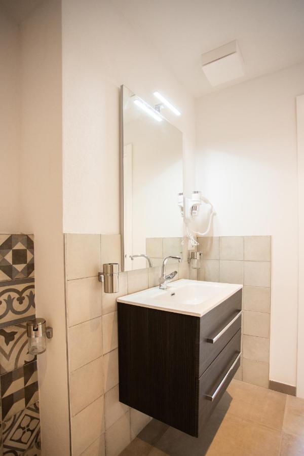 Alpencity Suites เตรนโต ภายนอก รูปภาพ