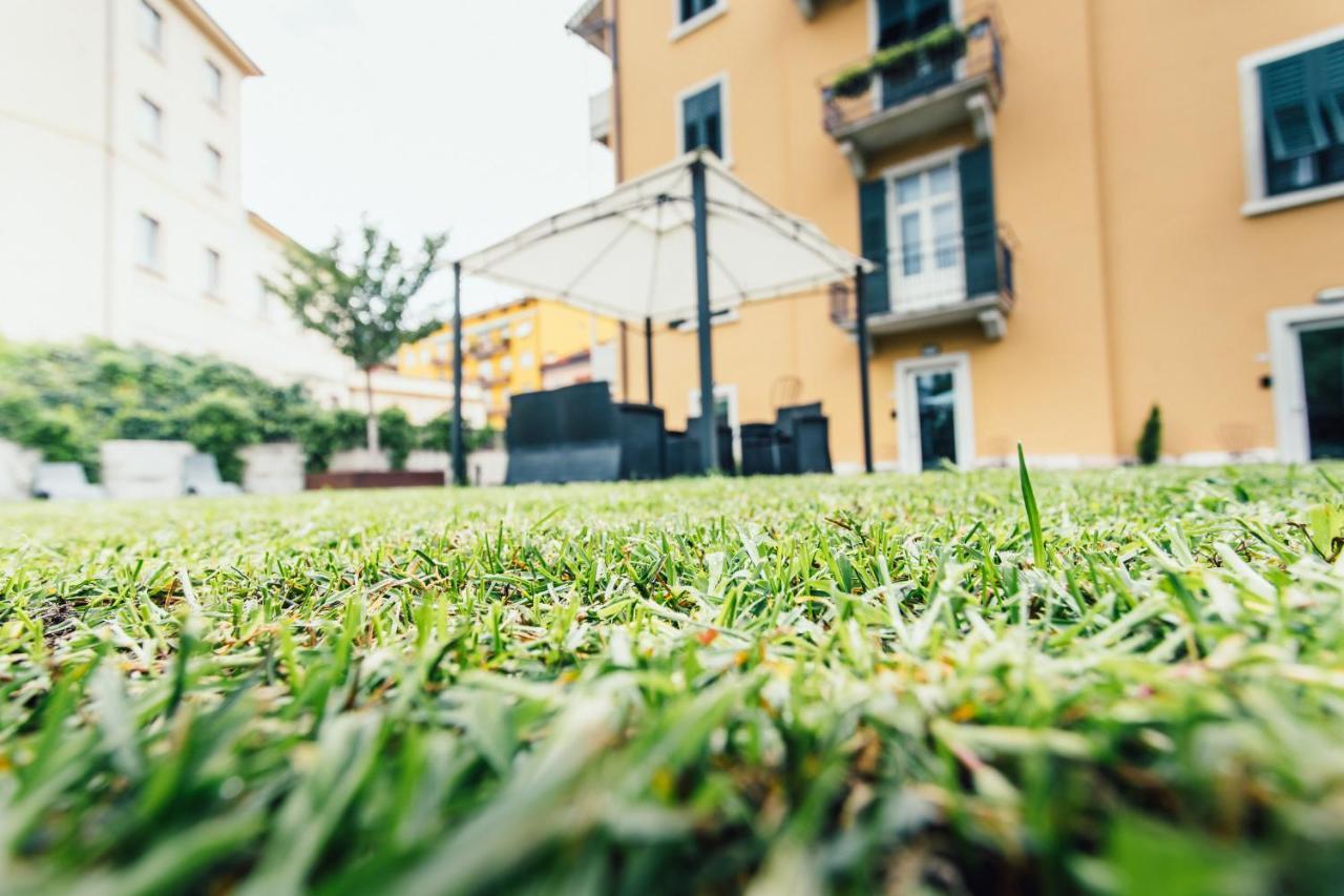 Alpencity Suites เตรนโต ภายนอก รูปภาพ